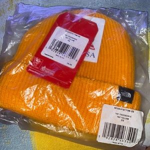 Brand new north face gold colored hat